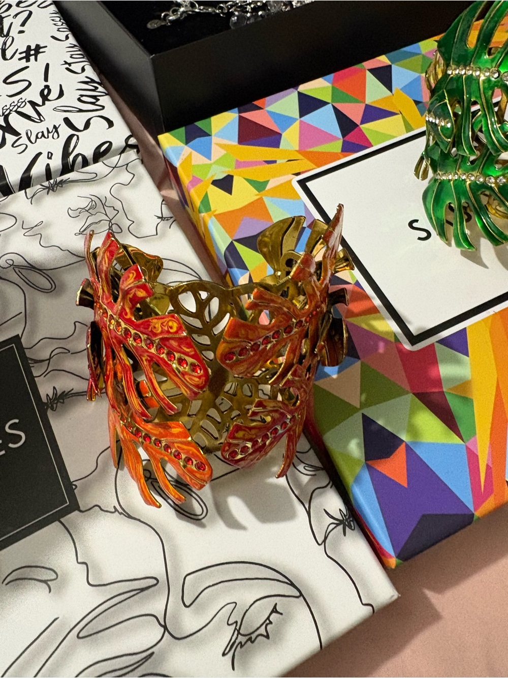 Sassy Jones Gold-Tone Cuff with Red and Orange Enamel Leaves